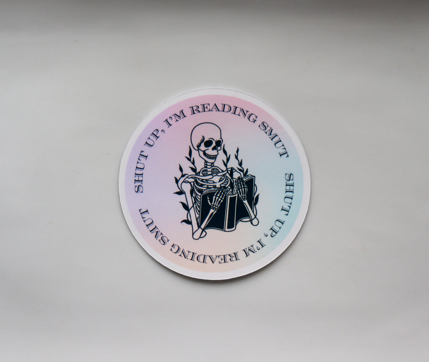 "Shut Up, I’m Reading Smut" Skeleton Sticker – Bookish Vinyl Decal
